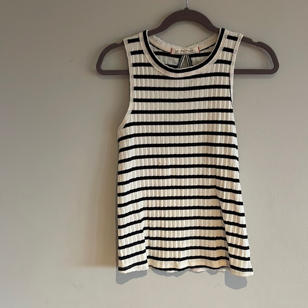 Black and white striped racer back cut tank with keyhole back.